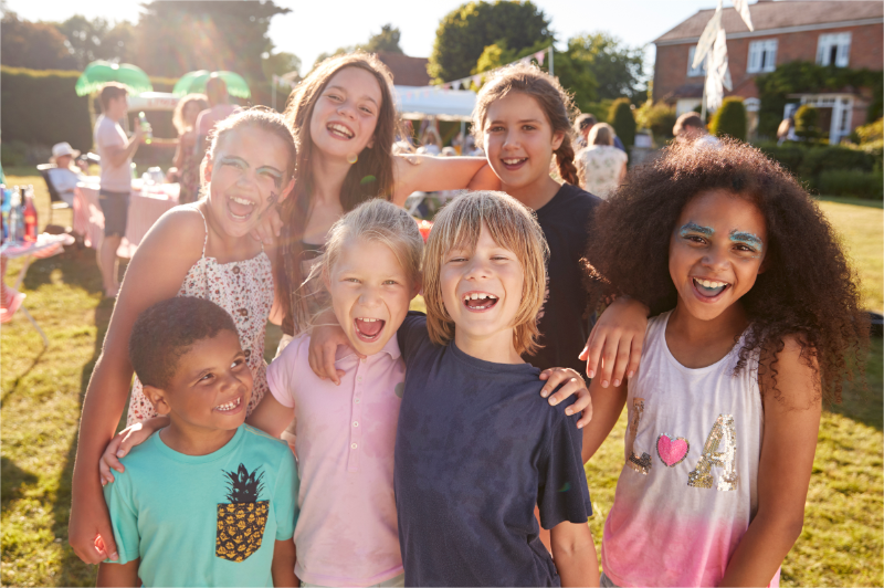 A group of children are raising money in a fundraising event.