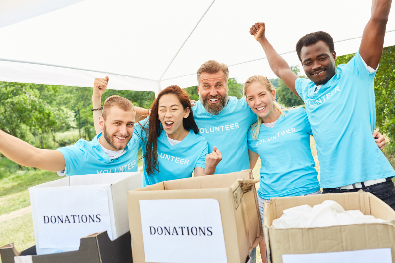 Volunteers are celebrating the success of the fundraising game.