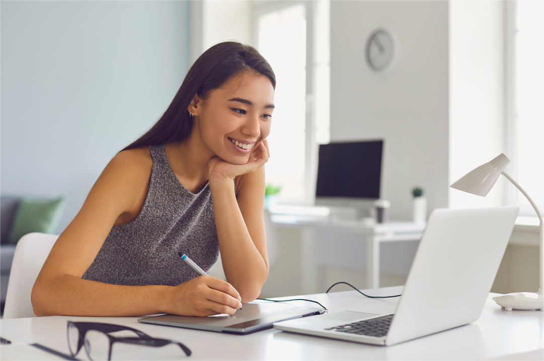 A woman is utilizing online team fundraising ideas happily.