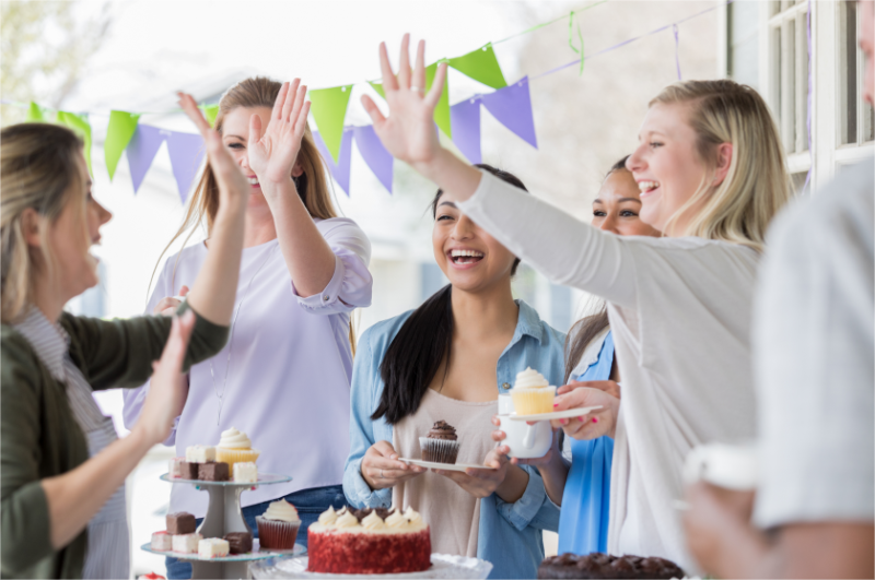Celebrating the success of bake sale fundraising.